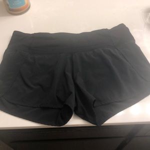 Lulu lemon black speed shorts .